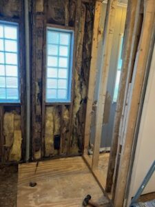 Room under renovation with exposed insulation.