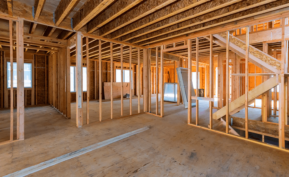 Wooden framework of a house under construction.