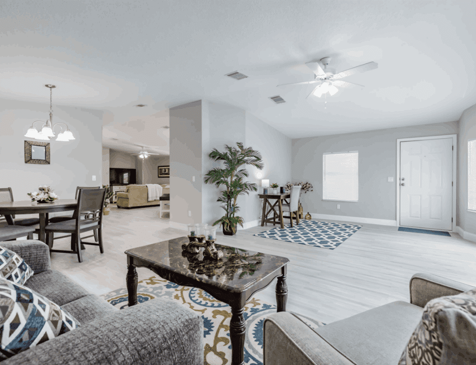Spacious modern living room with elegant decor.